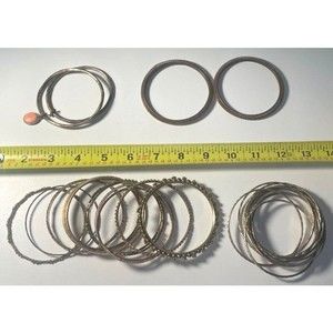 Lot #21 26 Pieces Gold Tone Metal Bangles